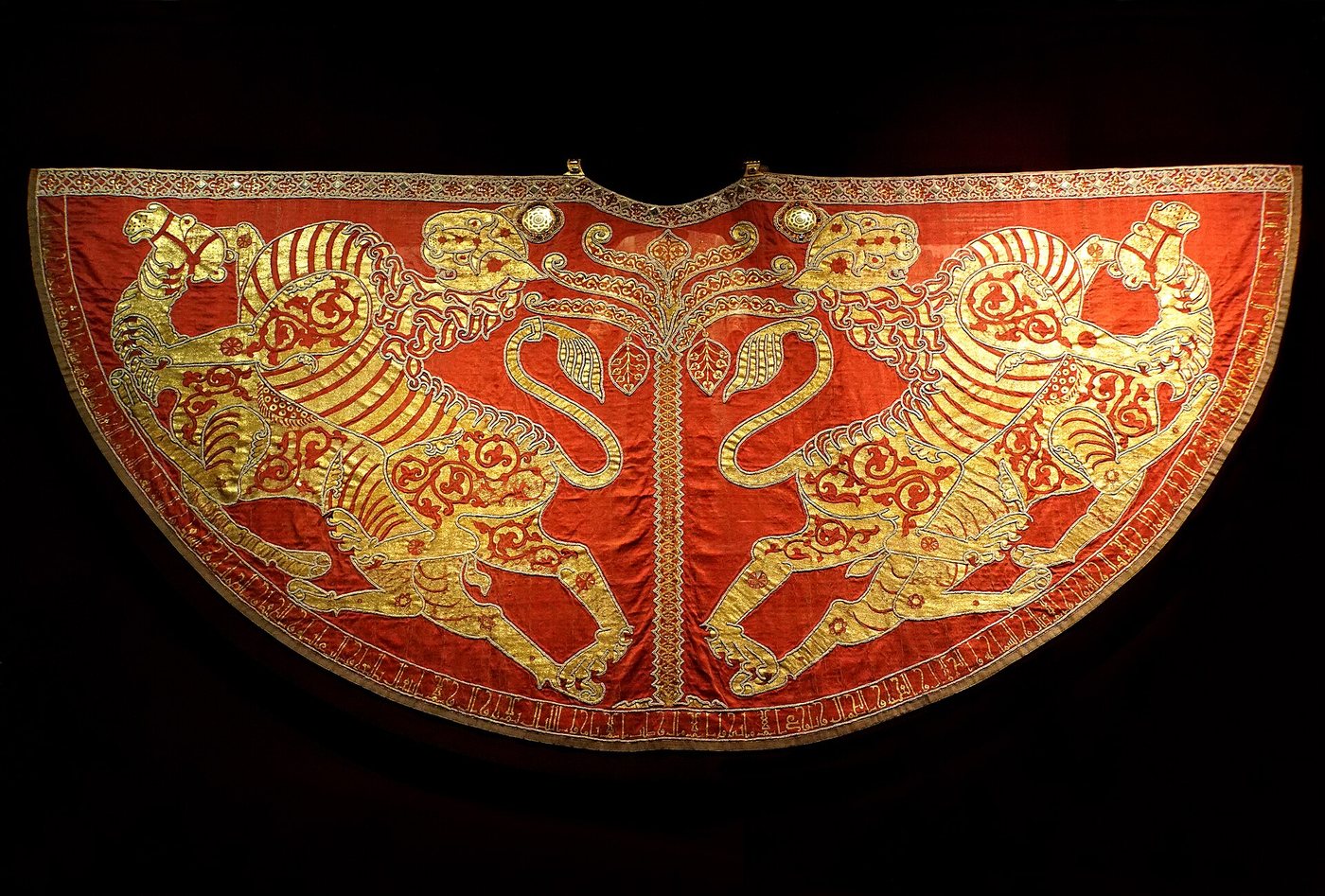 Red coronation mantle of Roger II with golden lions bringing down camels